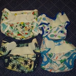 Four excellent used condition cloth diaper covers